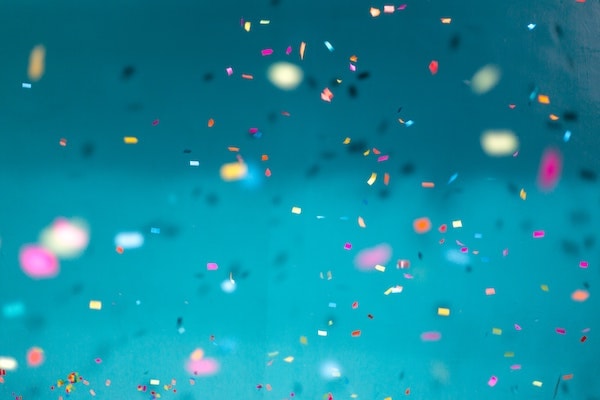 A closeup photo of falling confetti.